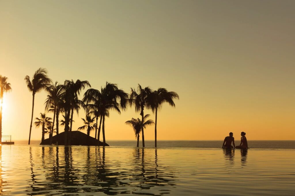 Dream Los Cabos Infinity Pool at Sunset with Royal Carriage Vacations