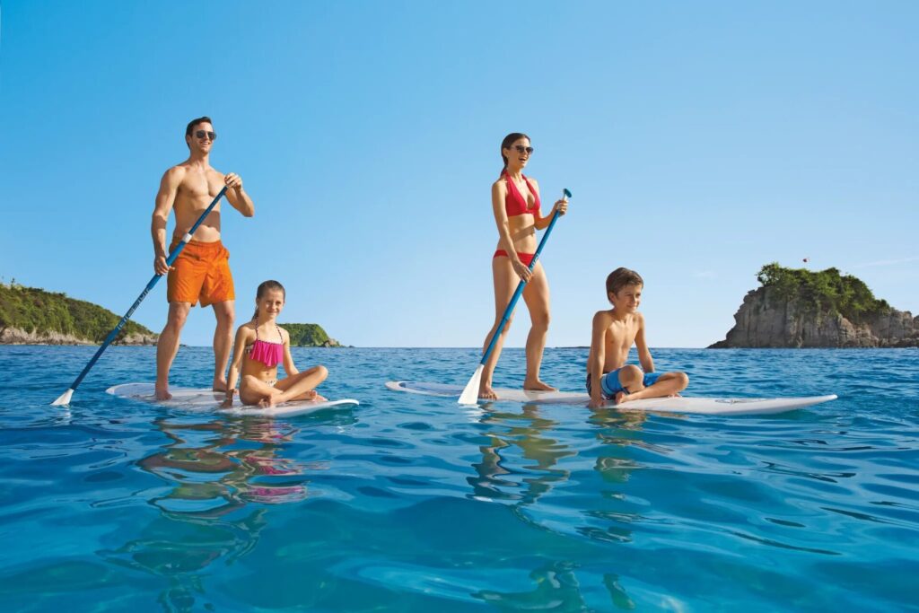 Famiy Paddle Boating at Dreams Huatulco Resort & Spa with Royal Carriage Vacations